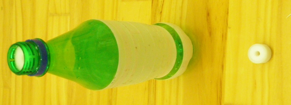 Bottle with bung to reduce flow